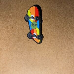🐊6/$12🐊 Rainbow Alien Skateboard Croc Charm